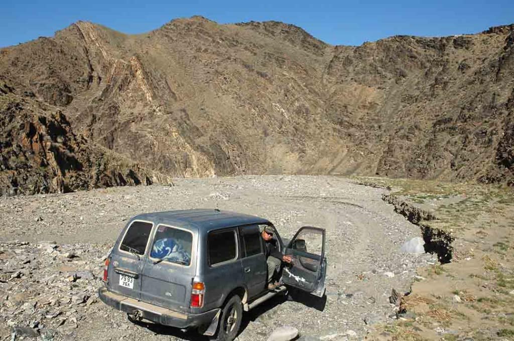 Two wheel ruts go into this Mongolian gorge - so there is a good chance we can get all the way through.