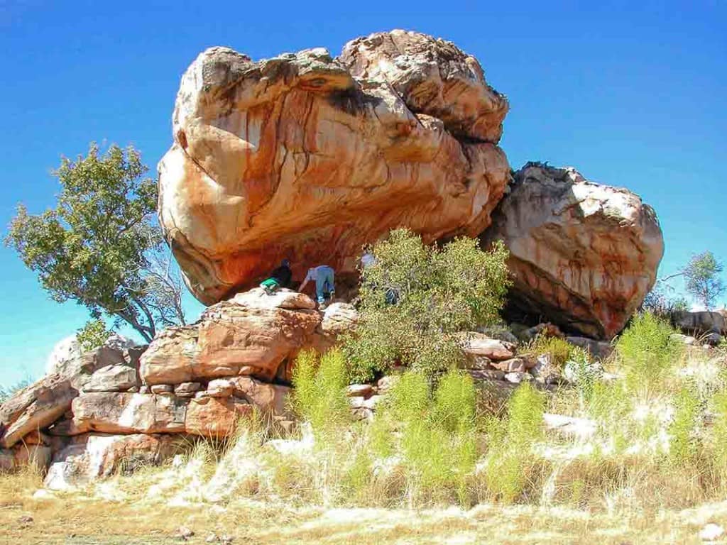 An example of a typical rock outcrop with Bradshaw rock paintings. There may be hundreds of paintings in such a spot - but little or no trace of who painted them in the ground below.