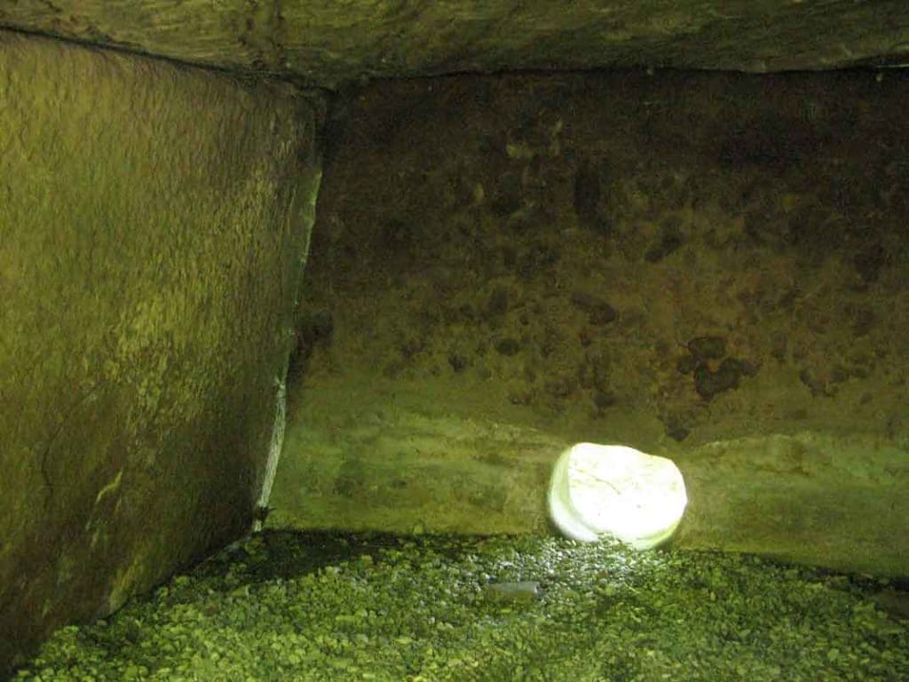 Interior view of a porthole dolmen at the 'Peasant Farm Enterprise 'Dolmen''. in South Russia.