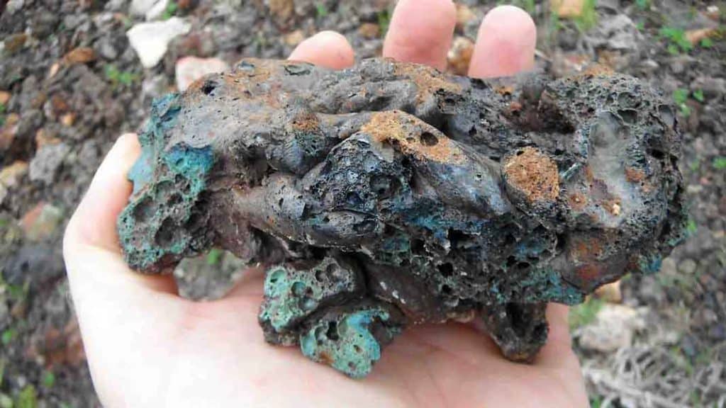 Greenish slag from bronze working.