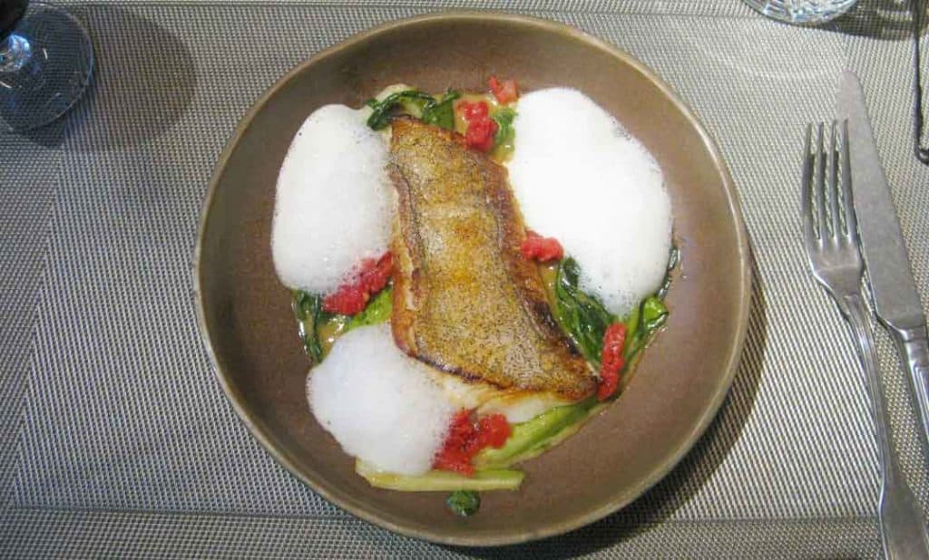 Halibut with creamy spinach and goat cheese