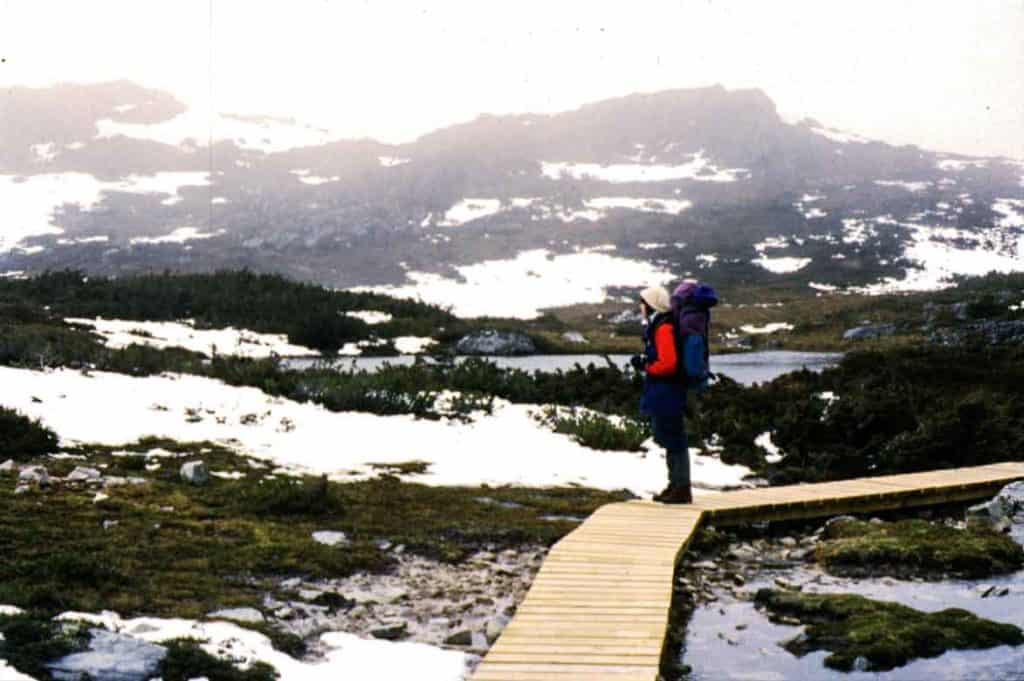 Somewhere on the Overland Track, wet. cold and snow on the ground.