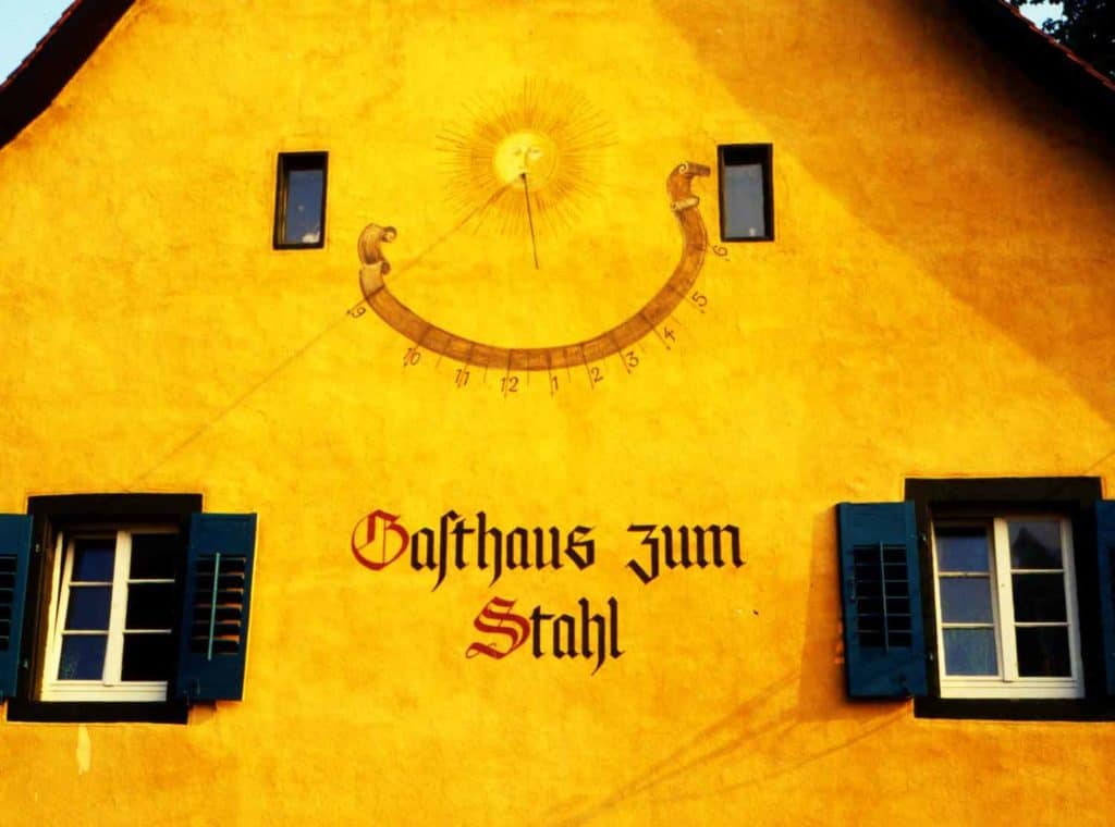 A sundial on the wall of one of the old Freiburg houses.